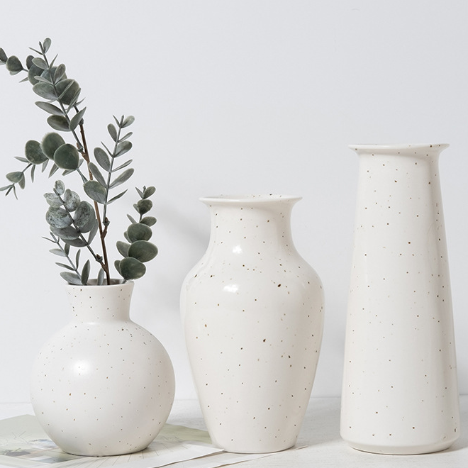 Spotted white ceramic vase