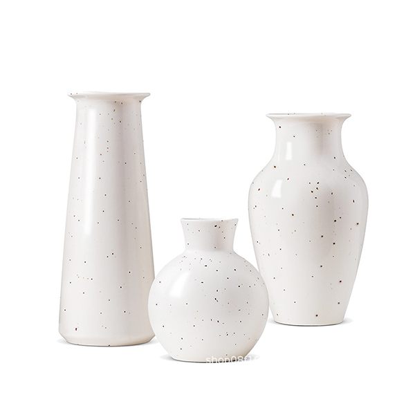 Spotted white ceramic vase